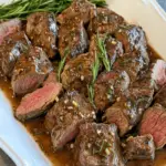 Million Dollar Roast Beef Tenderloin dish that will make any occasion feel special. The combination of perfectly seared beef, aromatic herbs, and a rich, flavorful butter-based sauce is unbeatable.